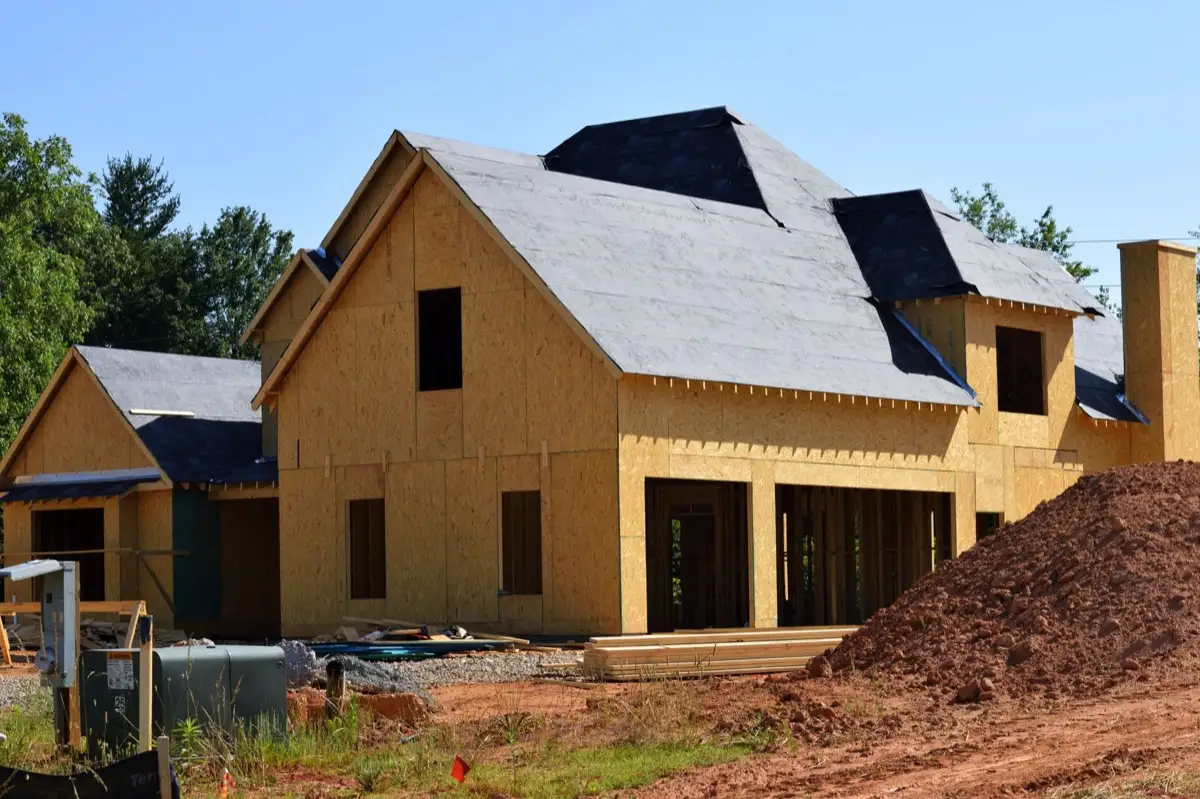 House with new roof decking and synthetic underlayment during a roof replacement in Warner Robins, GA